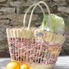 Panier à légumes blanc, rose et gris