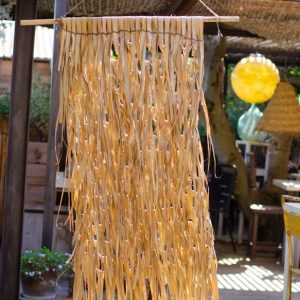 Décoration paille jaune à franges
