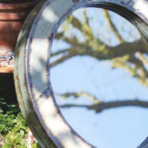 Miroir rond en métal vintage